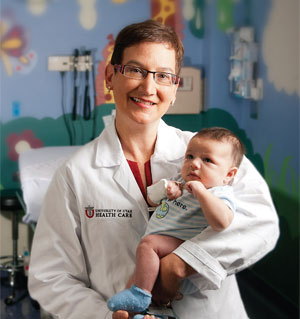 University Health Care specialist with an infant
